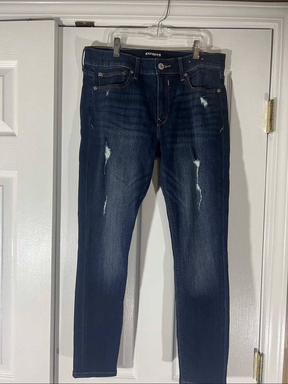 Express Women's Dark Navy Skinny Jeans with Light Distressing